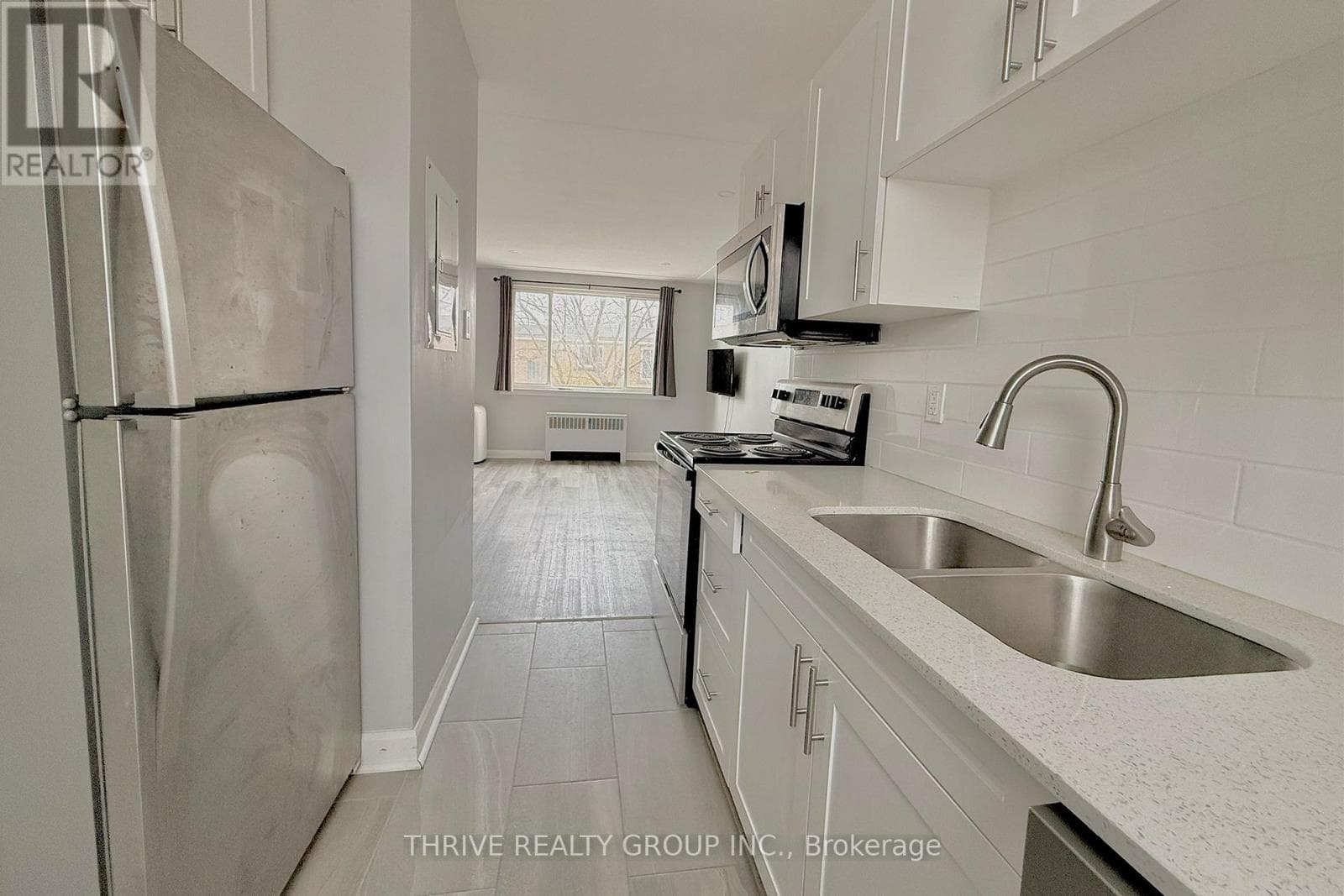 Renovated 2BR All-Inclusive Suite at 57 Wellington - Photo 2